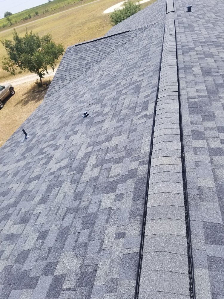 Slide of Monumental Roofing Services