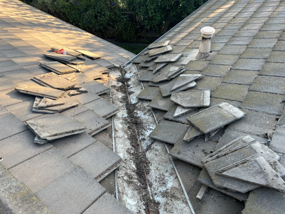 Slide of RRR Roofing