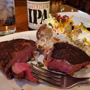 Outback Steakhouse - 9 oz filet cooked a perfect medium rare and a loaded baked potato! - Steakhouses Near Me - Phoenix, Arizona Outback Steakhouse - 9 oz filet cooked a perfect medium rare and a loaded baked potato! - Steakhouses Near Me - Phoenix, Arizona