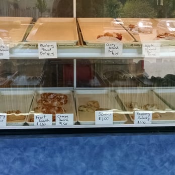 Simply Cinnamon Bakery - a display case full of baked goods - Bakeries Near Me - Pewaukee, Wisconsin