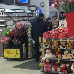 Walgreens - Here we see yet another line backing up! 5 in line, one poor cashier, employees down each of the first 2 aisles aren't helping!
