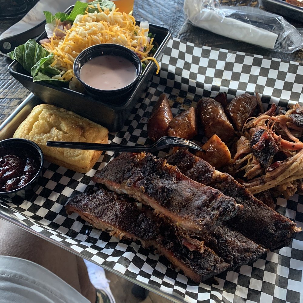 Smoke Justis - Ribs, House Salad, cornbread, sausage, and pulled pork Triple Smoked Meat Specialty Plate - Bars Near Me - Covington, Kentucky Smoke Justis - Ribs, House Salad, cornbread, sausage, and pulled pork Triple Smoked Meat Specialty Plate - Bars Near Me - Covington, Kentucky