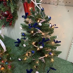Green Spot Garden Center - An adorable mini faux Christmas tree all decorated and lit up, ready to be displayed!