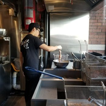 Monga Fried Chicken - Dipping the chicken in batter before dropping it into the deep fryer. - Taiwanese Near Me - Toronto, Ontario Monga Fried Chicken - Dipping the chicken in batter before dropping it into the deep fryer. - Taiwanese Near Me - Toronto, Ontario