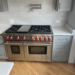 Novak & Parker - Wolf 48 inch range with Zephyr hood.