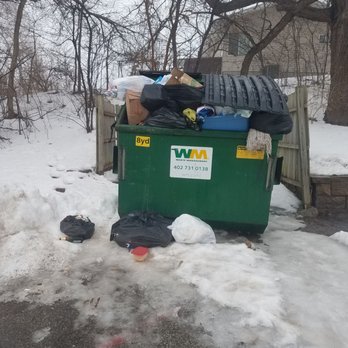 Orange Property Management - Hasn't been picked up in weeks. Icy lot. - Property Management Near Me - Omaha, Nebraska