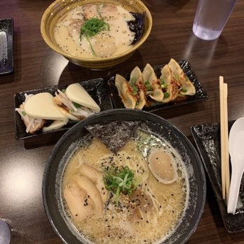 Noods Ramen Bar - Tori paitan ramen $13 (front), kakuni bao $7, garlic chili gyoza $6, and tonkotsu ramen $11 (back) - Ramen Near Me - Honolulu, Hawaii Noods Ramen Bar - Tori paitan ramen $13 (front), kakuni bao $7, garlic chili gyoza $6, and tonkotsu ramen $11 (back) - Ramen Near Me - Honolulu, Hawaii
