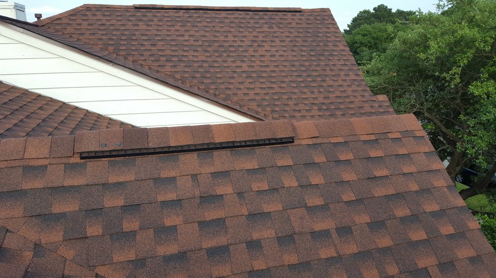 Slide of Cypress Rain Gutters