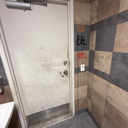 Graffiti on the walls and the doors have never been wiped down.