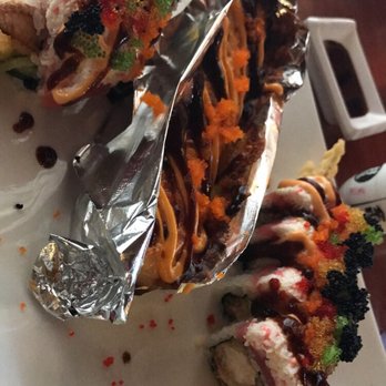 Sushi Sakana - Richard roll in foil. Topped with cheese. Tom roll on both sides. So good! - Sushi Bars Near Me - Port Royal, South Carolina Sushi Sakana - Richard roll in foil. Topped with cheese. Tom roll on both sides. So good! - Sushi Bars Near Me - Port Royal, South Carolina