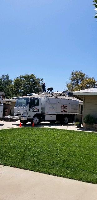 Slide of Al's Roofing & Gutters