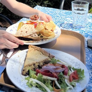 Photo of Bloodroot Vegetarian Restaurant - Bridgeport, CT, United States. New "burger" and mushroom quiche -- both delicious!