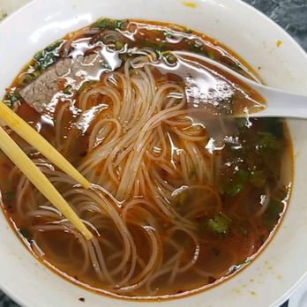 Pho Luc Lac - After wrecking my bowl with hot chili sauce. - Vietnamese Near Me - Houston, Texas
