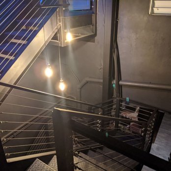 Scryer Rum - Blacked out industrial stairs. - Whiskey Bars Near Me - San Juan, Puerto Rico