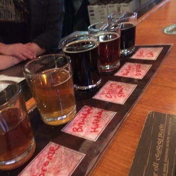 Dogfish Head Brewings & Eats - Beer flight is the way to go if you want to try a little bit of everything - American Near Me - Rehoboth Beach, Delaware Dogfish Head Brewings & Eats - Beer flight is the way to go if you want to try a little bit of everything - American Near Me - Rehoboth Beach, Delaware