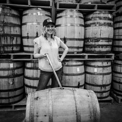 Sugar House Distillery - Model: Jen  In the barrel room before pulling a sample.