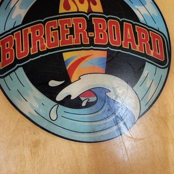 Burger-Board - On there surfboard table - Hot Dogs Near Me - Pacifica, California