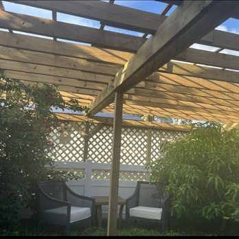 VZ Total Home - Inside the beautiful pergola VZ Total Home built. The bougainvillea & mango tree inside are the only trees that survived the hurricane. - Handyman Near Me - Venice, Florida VZ Total Home - Inside the beautiful pergola VZ Total Home built. The bougainvillea & mango tree inside are the only trees that survived the hurricane. - Handyman Near Me - Venice, Florida