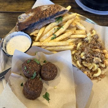 King Tut - Falafel (with fava beans), tahini, fries and hawashy with a side of koshary - Egyptian Near Me - Brecksville, Ohio