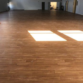 Eli Carpet - an empty room with wood floors - Carpeting Near Me - Woodside, New York