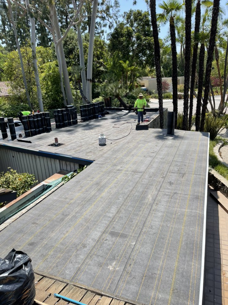 Slide of New Village Roofing