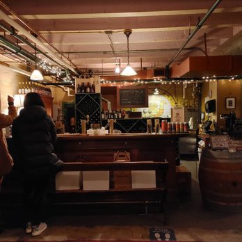 Edgefield Winery - two people standing at the bar - Wineries Near Me - Troutdale, Oregon Edgefield Winery - two people standing at the bar - Wineries Near Me - Troutdale, Oregon