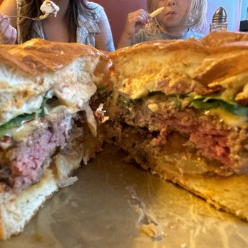 Club 21 - Perfectly cooked rare burger - Bars Near Me - Wales, Michigan
