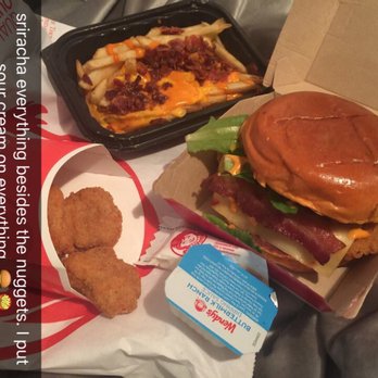 Wendy's - sriracha chicken burger w sriracha bacon fries and regular six piece nuggets. when did nuggets become one cm small? huge pass on the fries. - Burgers Near Me - Nanuet, New York