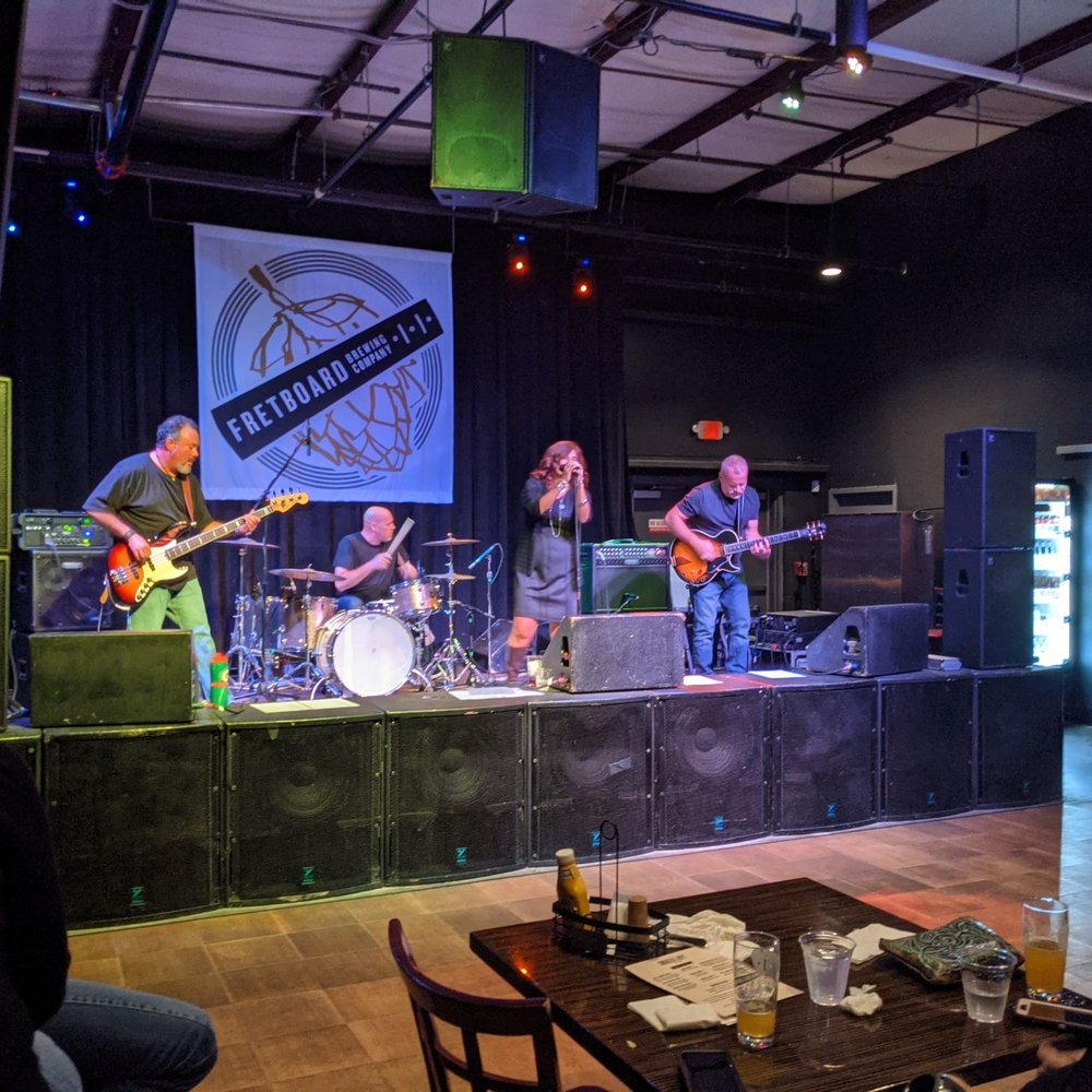 Fretboard Brewing - One of the many bands rocking the stage. - Breweries Near Me - Cincinnati, Ohio Fretboard Brewing - One of the many bands rocking the stage. - Breweries Near Me - Cincinnati, Ohio