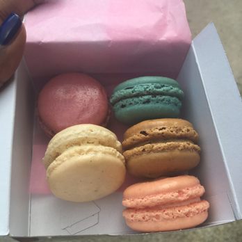 Le Macaron French Pastries - Clockwise from top; lavender, black currant, Colombian coffee, rose, and Madagascar black vanilla with one vanilla macaron missing - Coffee & Tea Near Me - St. Augustine, Florida