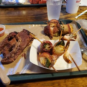 Photo of Hard Eight BBQ - The Colony, TX, United States. Brisket, bacon wrapped shrimp, bacon wrapped chicken, jalepeno corn