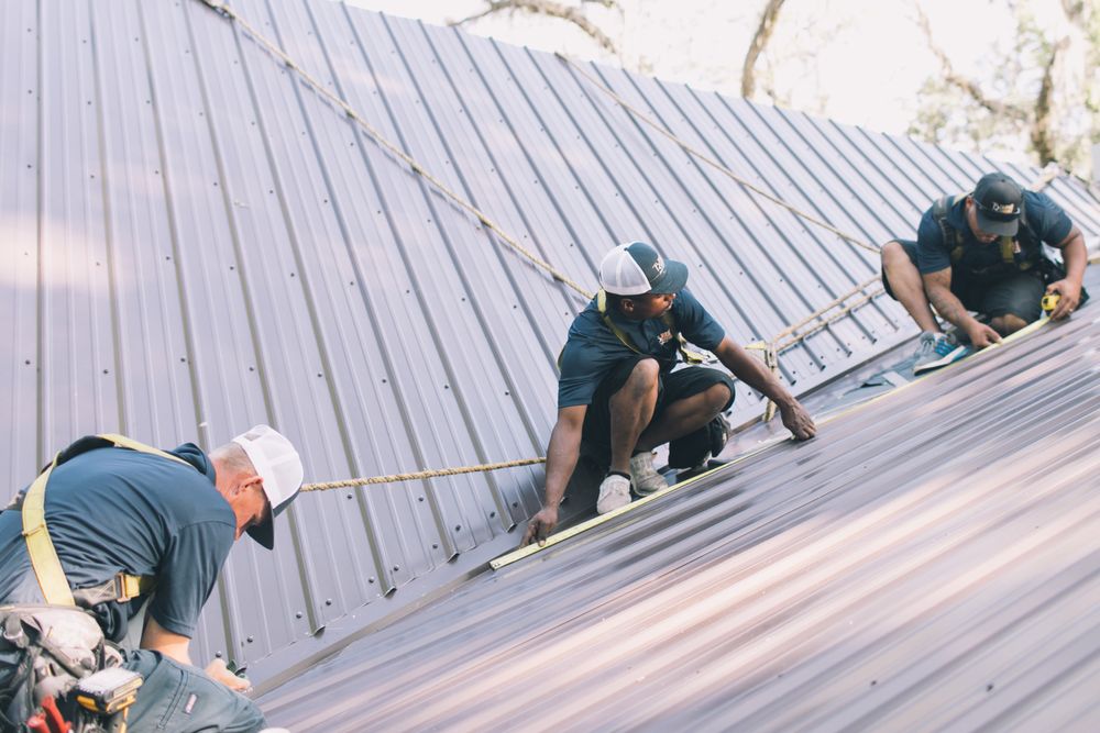 Slide of Tadlock Roofing