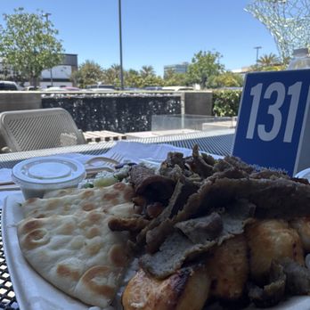 Luna Grill Cerritos - Chicken Kabob & Gyro Meat Plate with a lovely fountain backdrop - Mediterranean Near Me - Cerritos, California Luna Grill Cerritos - Chicken Kabob & Gyro Meat Plate with a lovely fountain backdrop - Mediterranean Near Me - Cerritos, California