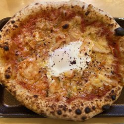 Flat Earth Pizzas - Kimchi pizza with runny egg