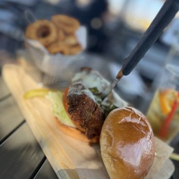 Waypoint Cafe - Crispy Spicy Chicken Sandwich w Side Onion Rings - American Near Me - Camarillo, California Waypoint Cafe - Crispy Spicy Chicken Sandwich w Side Onion Rings - American Near Me - Camarillo, California