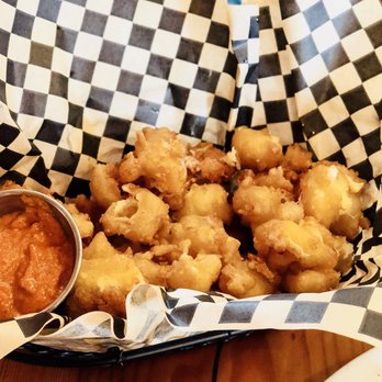 Buoy Beer - CHEDDAR CHEESE CURDS: Buoy Beer tempura-battered fried Ellsworth curds with Spanish Romesco sauce - meh... - Brewpubs Near Me - Astoria, Oregon Buoy Beer - CHEDDAR CHEESE CURDS: Buoy Beer tempura-battered fried Ellsworth curds with Spanish Romesco sauce - meh... - Brewpubs Near Me - Astoria, Oregon