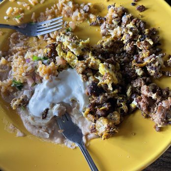 Las Margaritas - Eggs with chorizo was very dark tasted burnt plate included rice and beans - Mexican Near Me - Pomona, California
