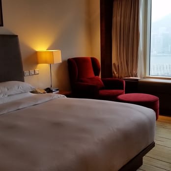香港凱悅酒店 - Living space of our standard harbor view room. - Hotels Near Me - Hong Kong, HK 香港凱悅酒店 - Living space of our standard harbor view room. - Hotels Near Me - Hong Kong, HK