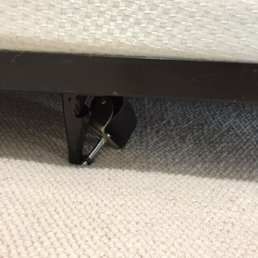 Wheel not snapped back into the bed frame. Wheel not snapped back into the bed frame.