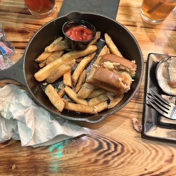 Kelly's Half Shell Pub - Lobster roll but half's gone because I ate it - Irish Pub Near Me - Crystal River, Florida