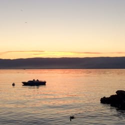 Restaurant Les Cygnes - Love the sunset colors from the patio! Another beautiful day on Lac Léman.