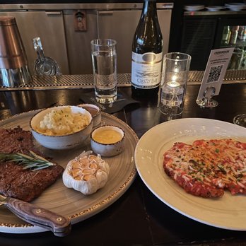 Crossroads Kitchen - Eggplant skirt steak with mashed potatoes, and Scallopini Parmesan - Vegan Near Me - Los Angeles, California Crossroads Kitchen - Eggplant skirt steak with mashed potatoes, and Scallopini Parmesan - Vegan Near Me - Los Angeles, California