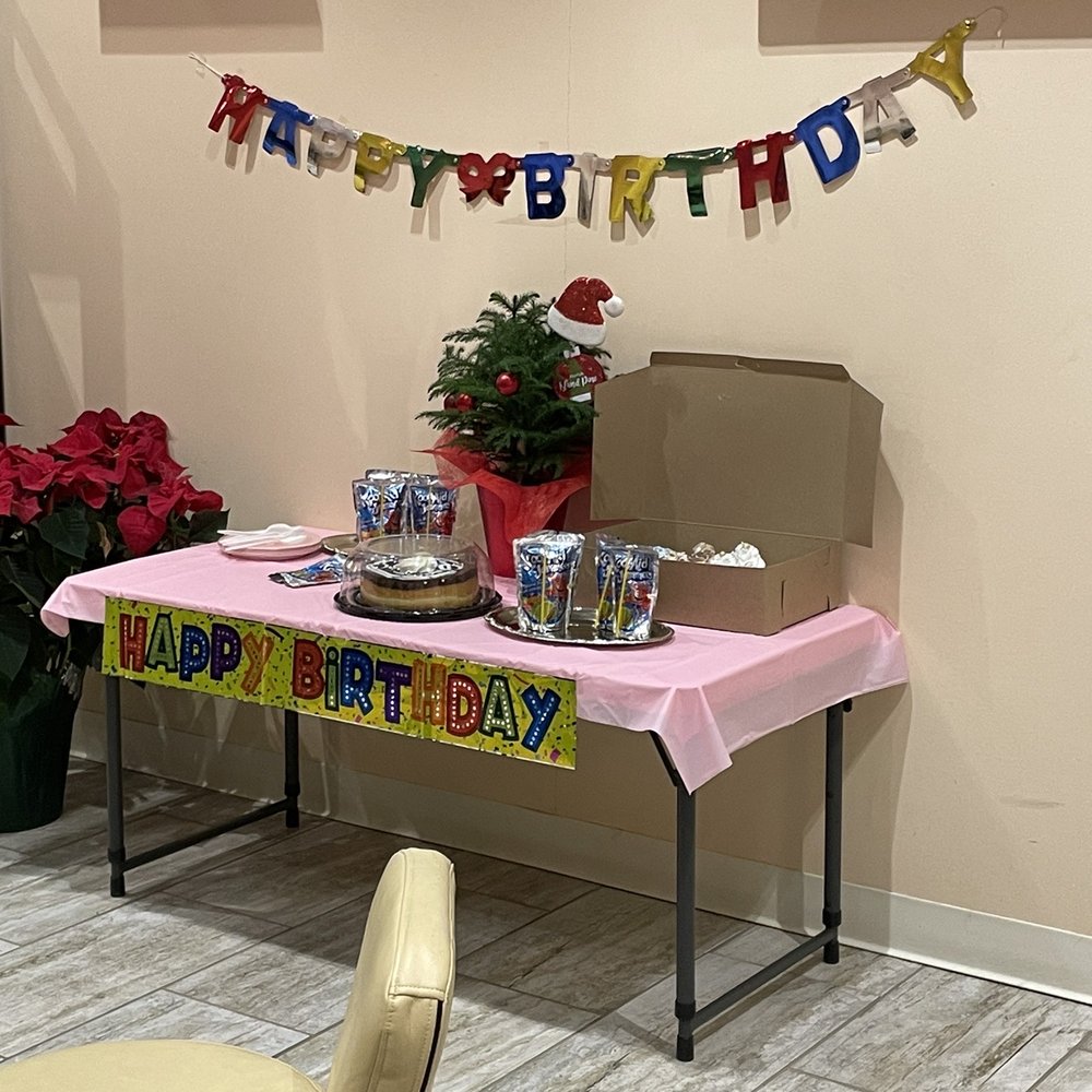 The set up when we arrived plus the box of cupcakes we brought