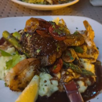 Rancho Capistrano Winery - Surf and Turf, steak with an awesome demi glaze, grilled shrimp, mashed potatoes matched the glaze perfectly, and 4 fat asparagus. - Seafood Near Me - San Clemente, California Rancho Capistrano Winery - Surf and Turf, steak with an awesome demi glaze, grilled shrimp, mashed potatoes matched the glaze perfectly, and 4 fat asparagus. - Seafood Near Me - San Clemente, California