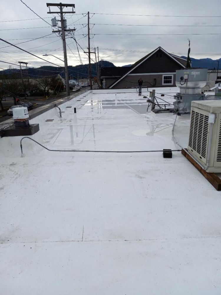 Slide of Tiger Roofing