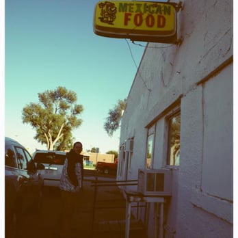 El Rancho Cafe - a woman standing in front of a mexican food restaurant - Mexican Near Me - Holcomb, Kansas El Rancho Cafe - a woman standing in front of a mexican food restaurant - Mexican Near Me - Holcomb, Kansas