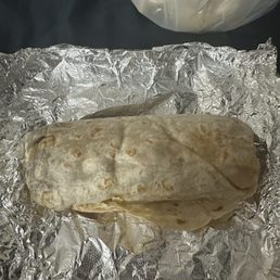 Carne asada burrito. Very little meat, mostly just beans and rice Carne asada burrito. Very little meat, mostly just beans and rice