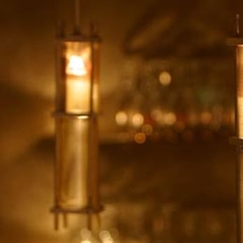 Anotheroom - a row of light bulbs hanging from the ceiling - Lounges Near Me - New York, New York Anotheroom - a row of light bulbs hanging from the ceiling - Lounges Near Me - New York, New York