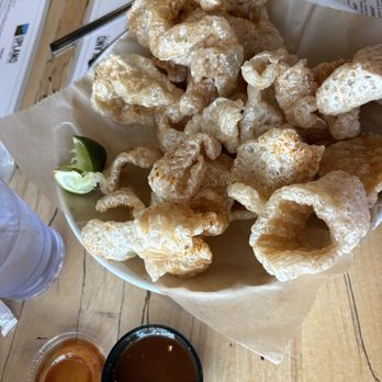 Upland Brewing Co. Bloomington Brewpub - Chicharrons with lime and bbq sauce - Brewpubs Near Me - Bloomington, Indiana Upland Brewing Co. Bloomington Brewpub - Chicharrons with lime and bbq sauce - Brewpubs Near Me - Bloomington, Indiana
