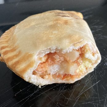 Maria Empanada - Egg & Potato plus teeth marks - Empanadas Near Me - Denver, Colorado